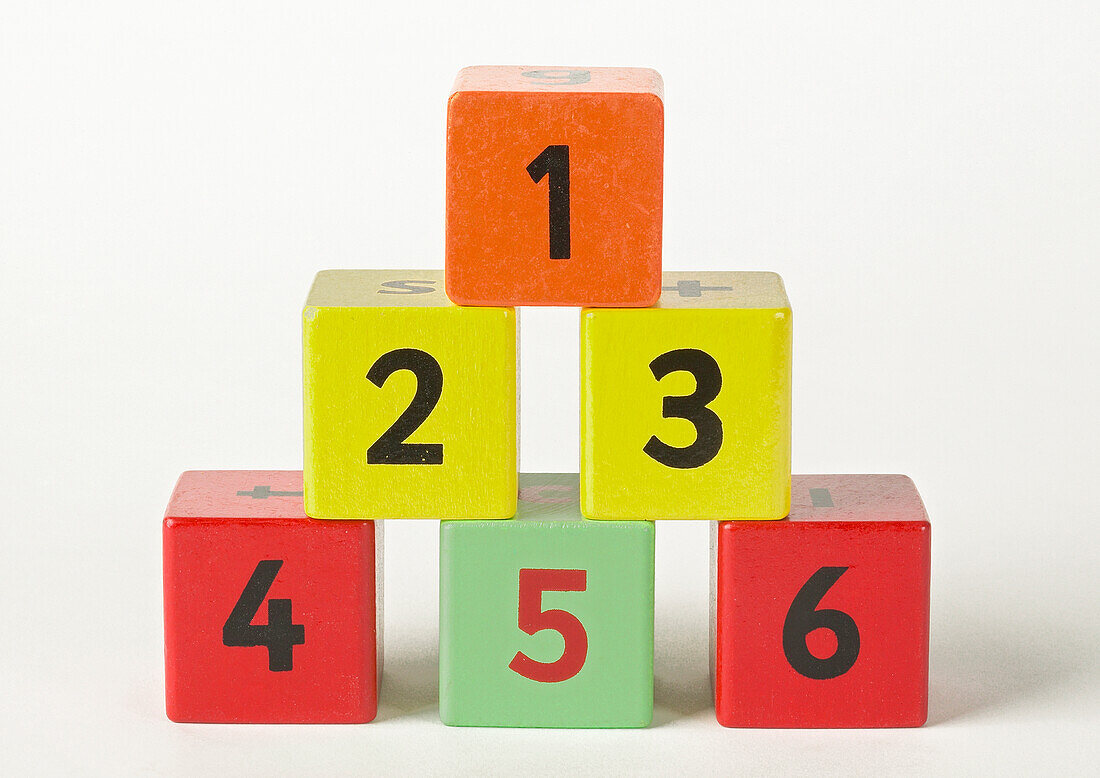 Pyramid of wooden blocks with numbers on