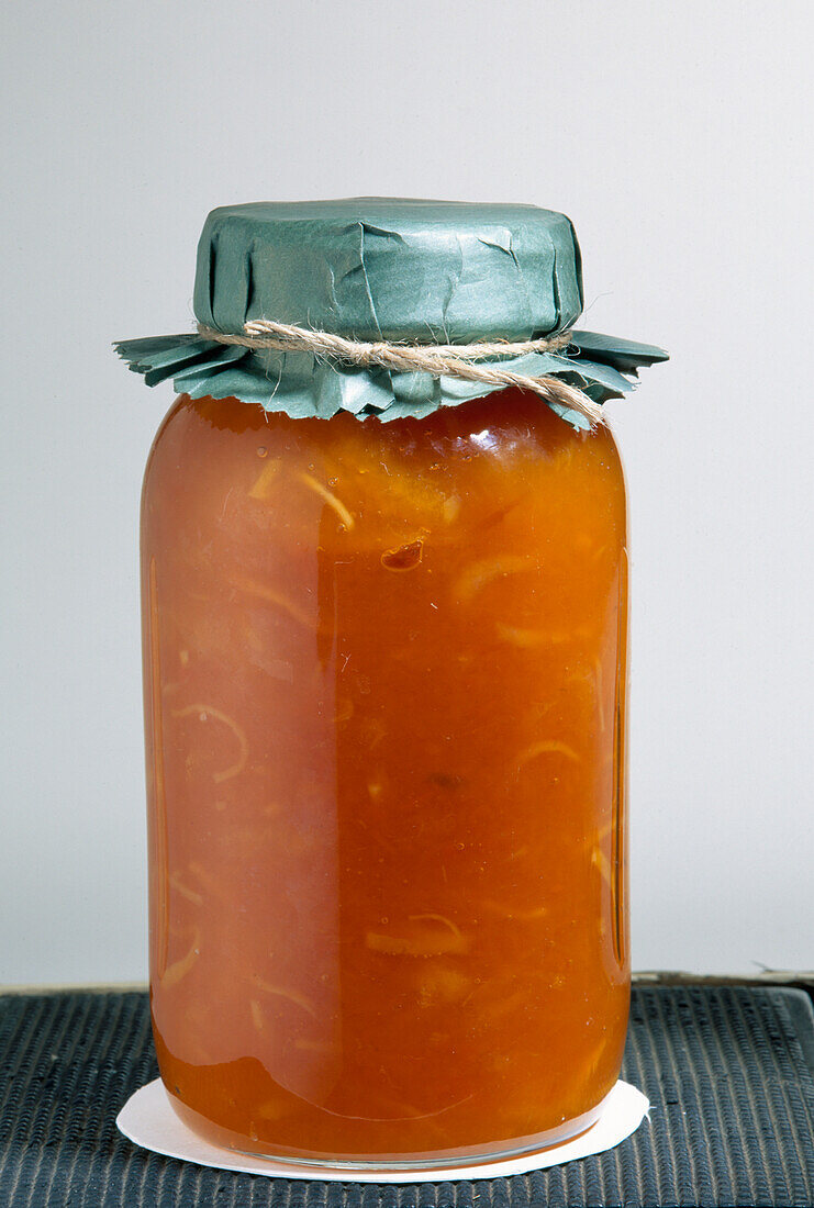 Glass jar of orange pumpkin marmalade