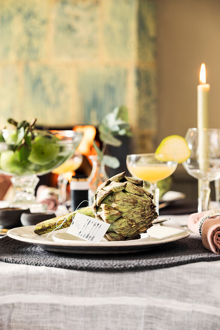 Artichokes decorating a festively laid table