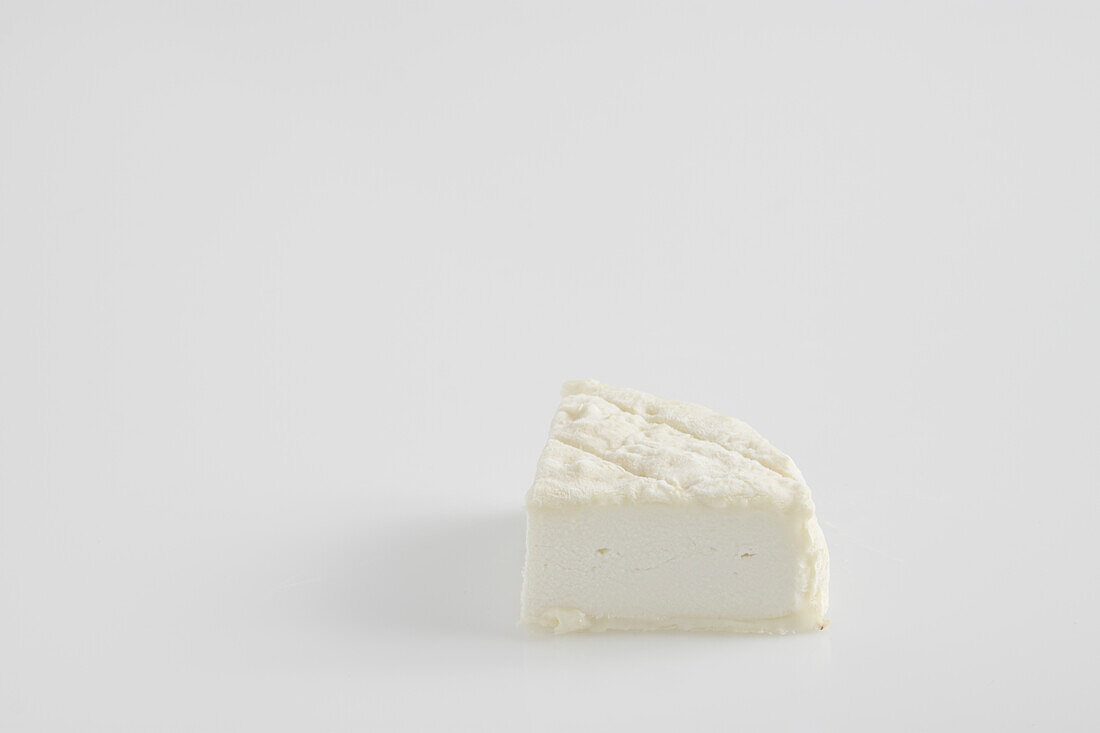 Slice of French Mothais-sur-Feuille goat's cheese