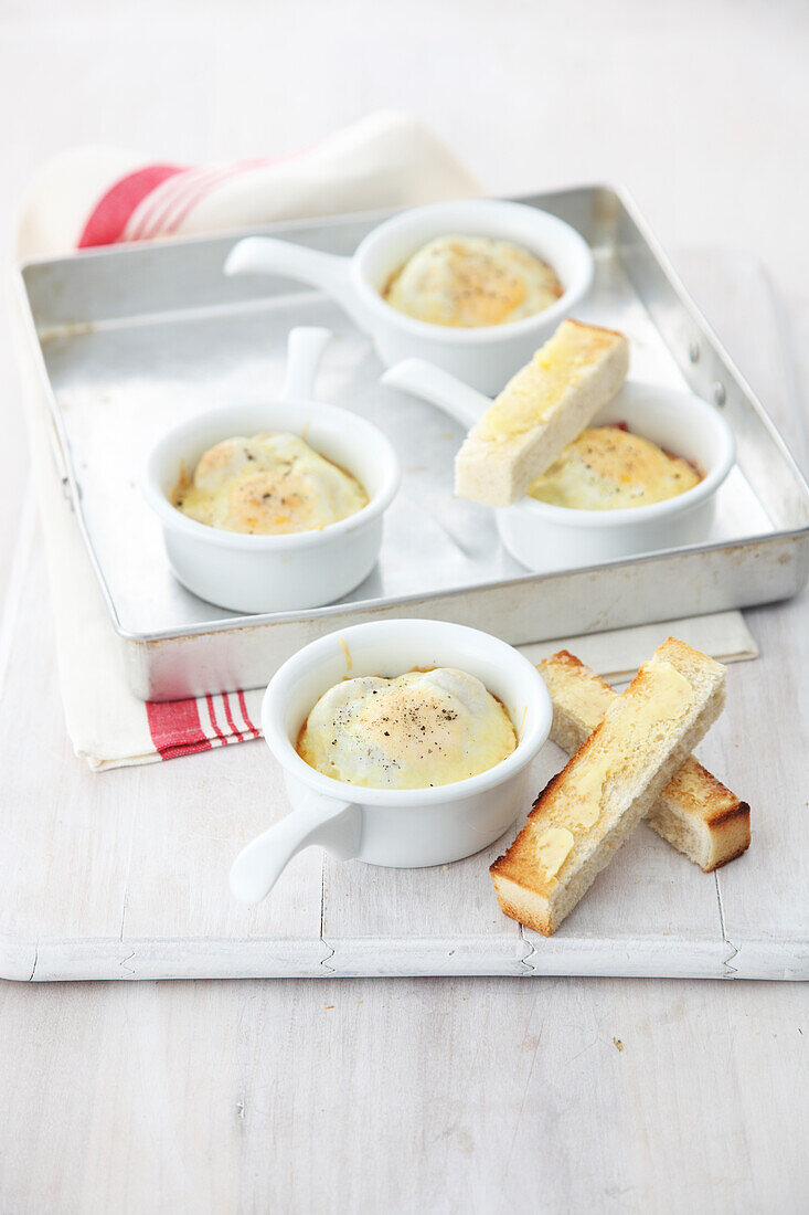 Mini baked egg, ham and cheese with toast fingers