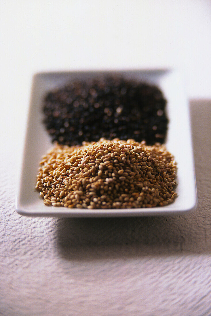 Toasted sesame seeds on rectangular dish