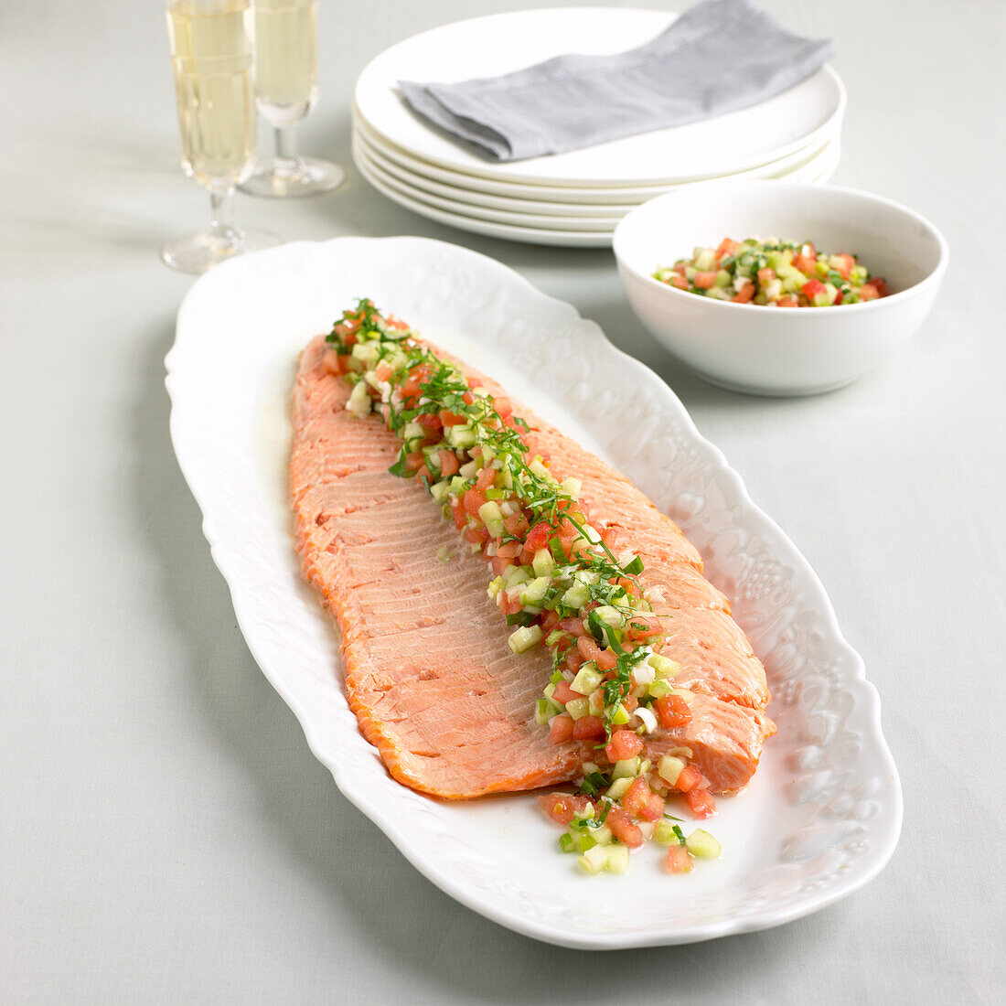 Hot baked trout with tomato and basil salsa
