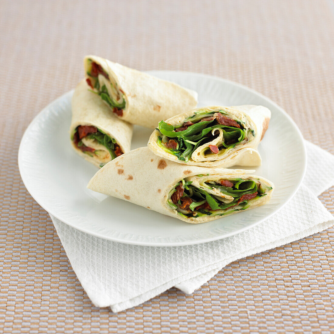 Griddled courgette, semi-dried tomato and rocket wraps