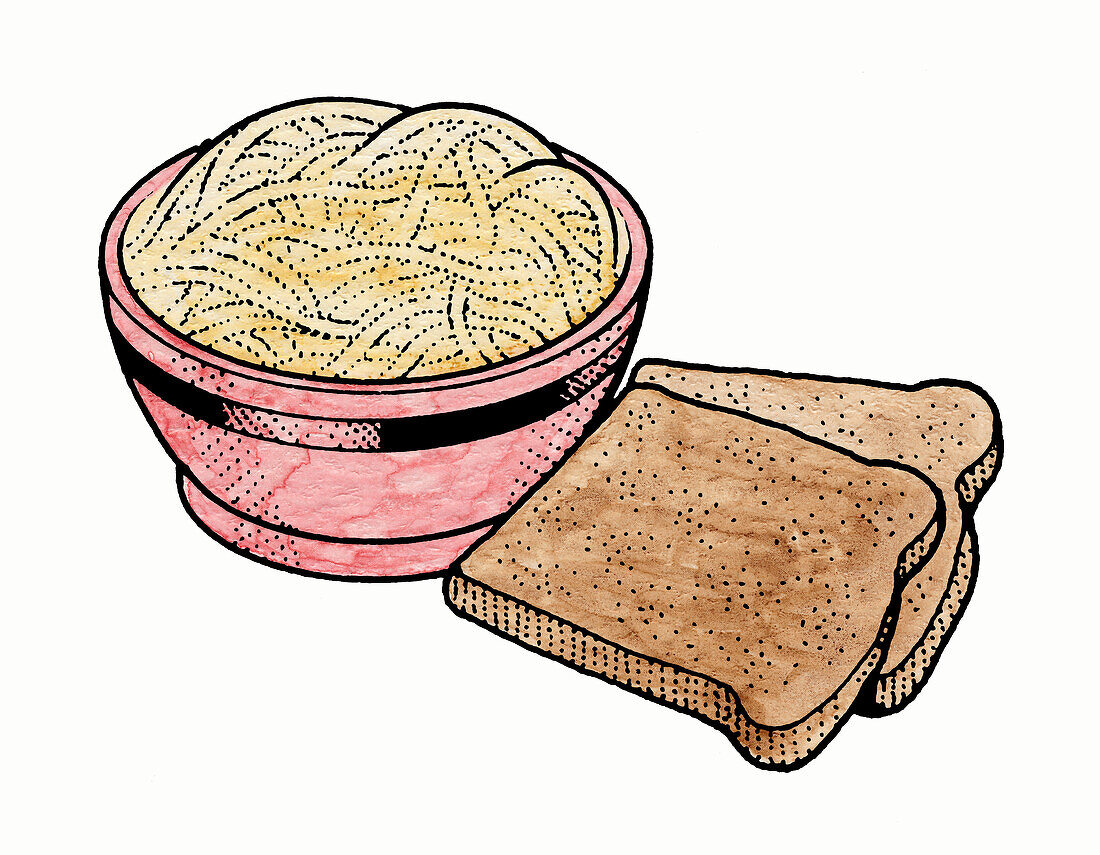 Bowl of spaghetti and two slices of wholegrain bread