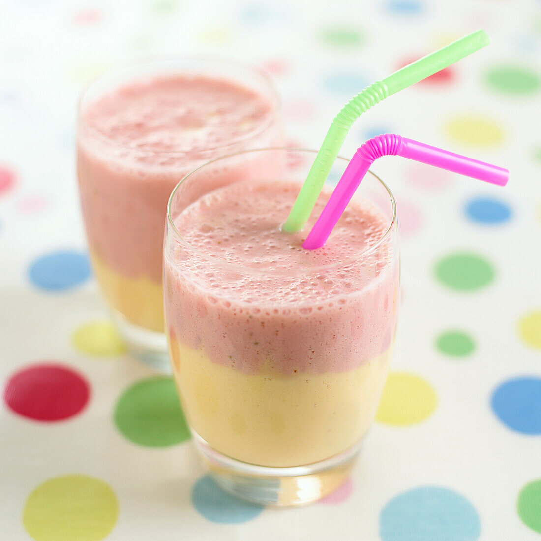 Two banana and strawberry smoothies