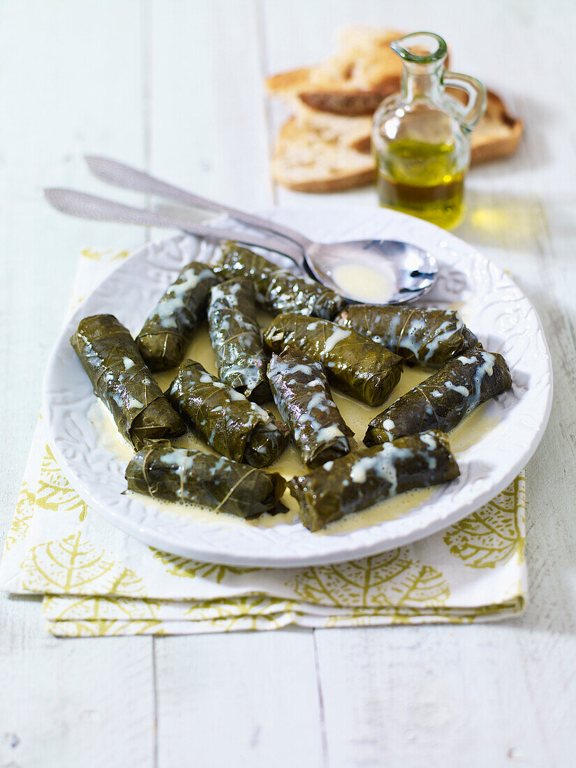 Greek stuffed vine leaves in creamy sauce