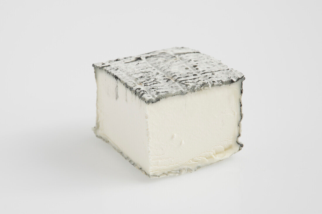 Square slice of French Pave Blesois goat's cheese