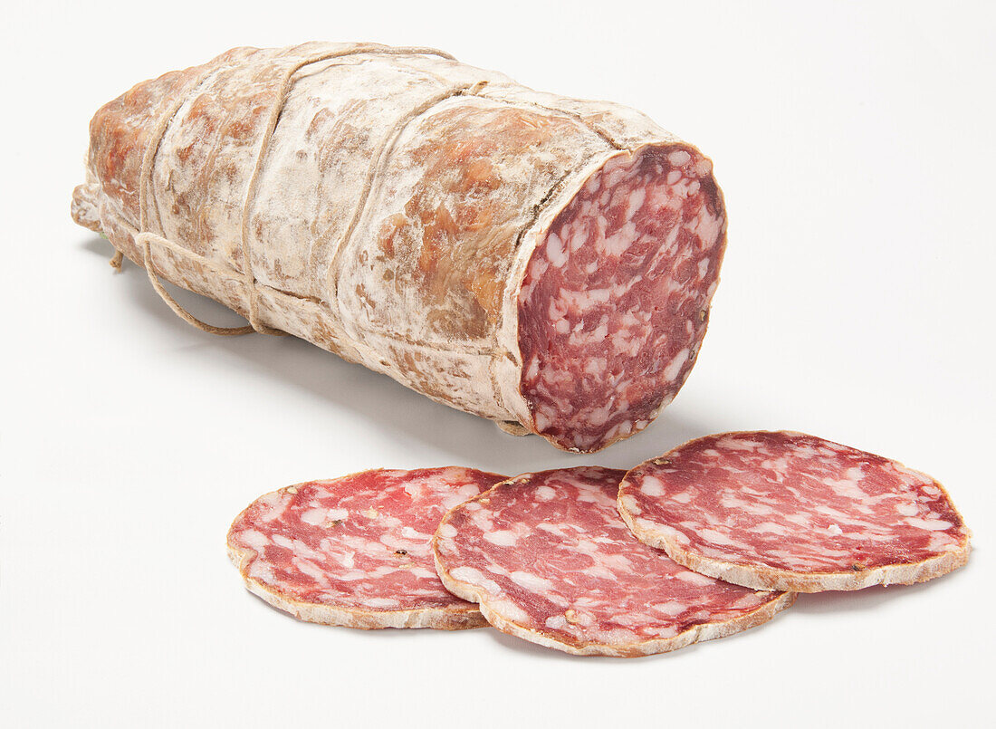 Sliced and halved Tuscan salami