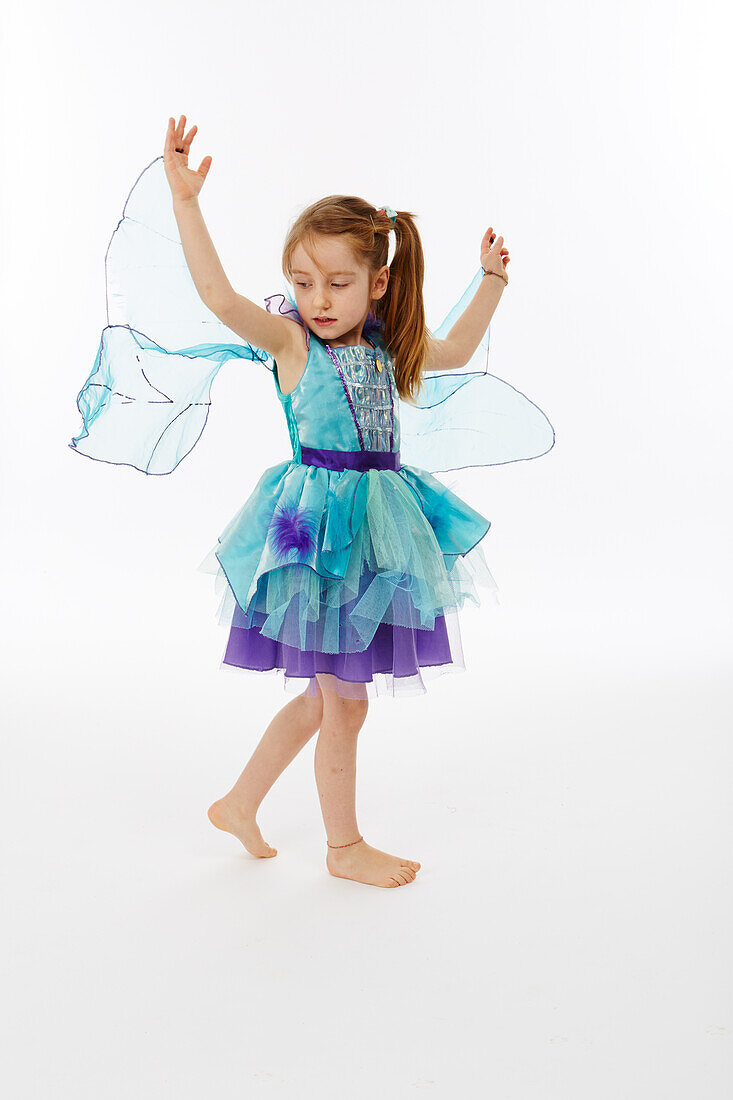 Girl playing in fairy costume
