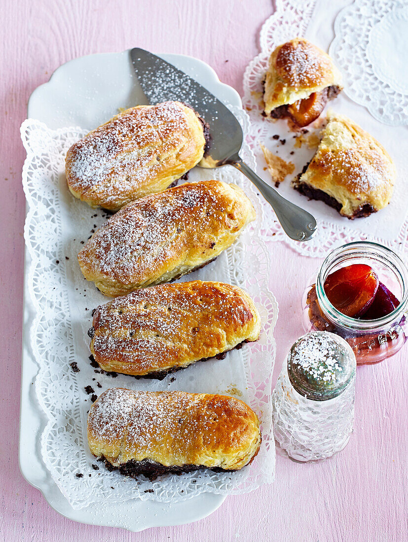 Small strudels with red plums and poppy seed