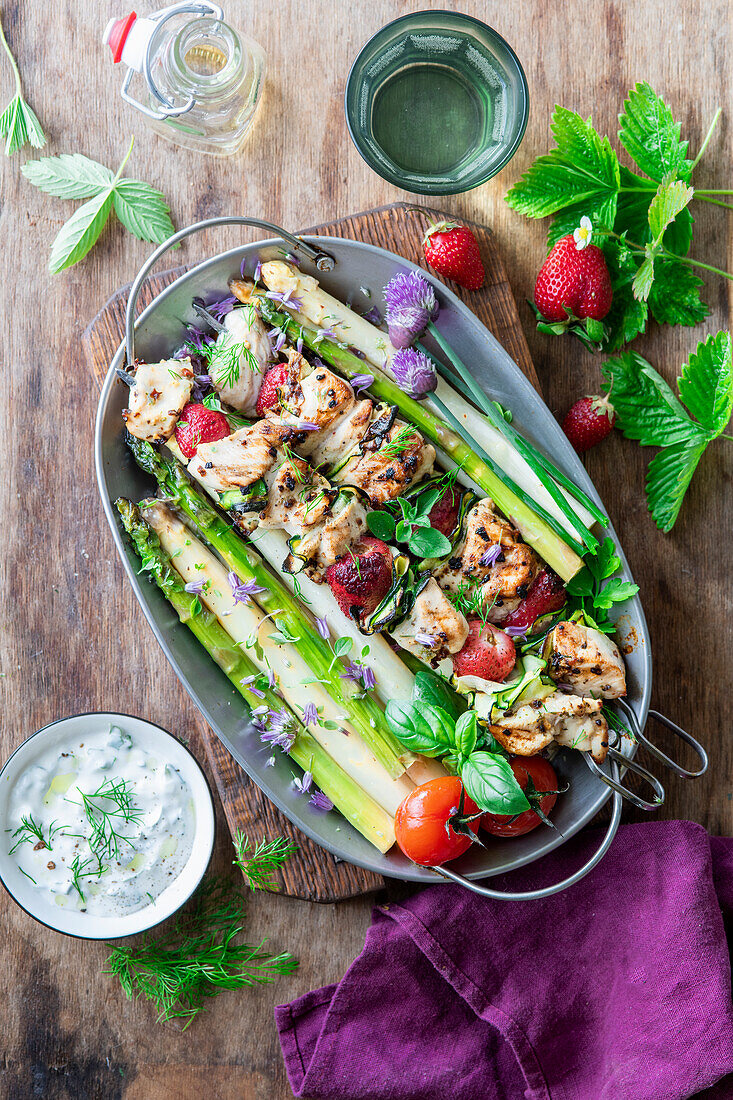 Asparagus with chicken strawberry skewers