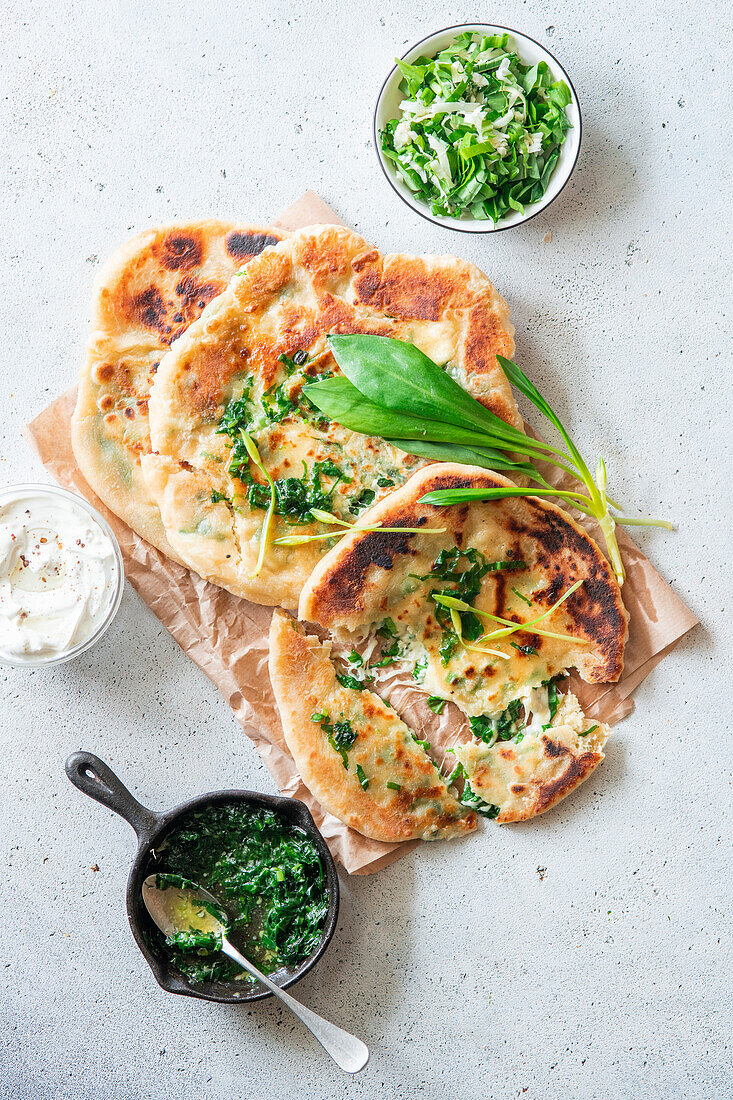 Wild garlic flatbreads stuffed with cheeses