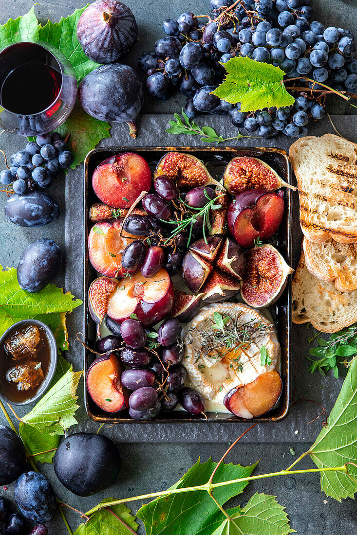 Baked autumn fruit with camembert cheese