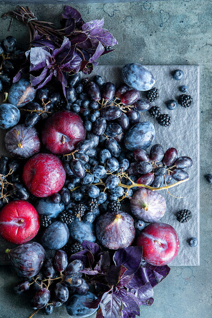 Autumn fruits in red and blue