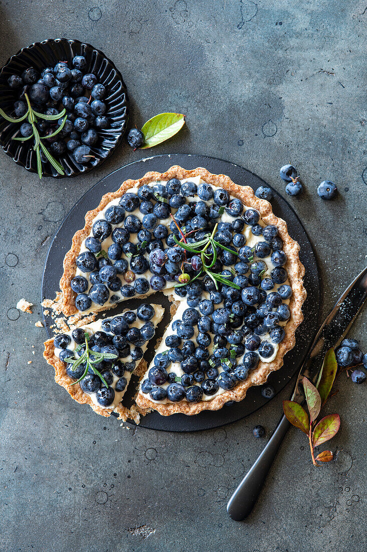 Blueberry pie with rosemary custard cream