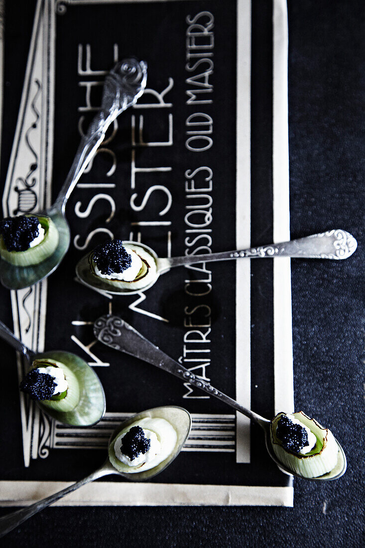 Spoon with leek and caviar