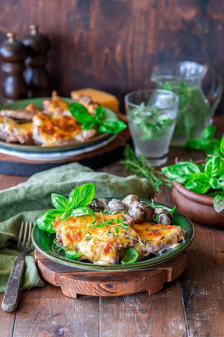 Pork chops with cheese and mushrooms