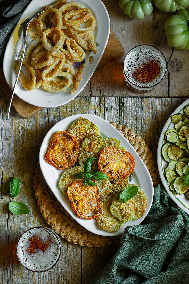 Fried green tomato slices and fried calamarie