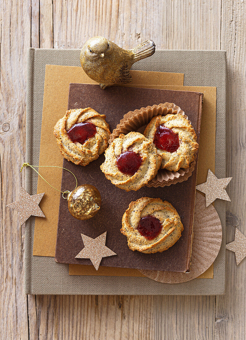 Christmas sprinkled biscuits with poppy seeds and jam