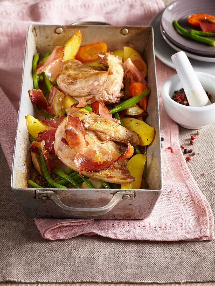 Baked pheasant with Black Forrest ham and vegetables