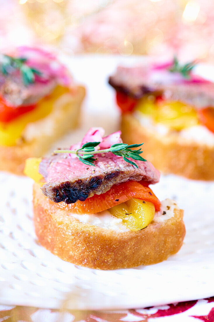 Canapes with beef and peppers