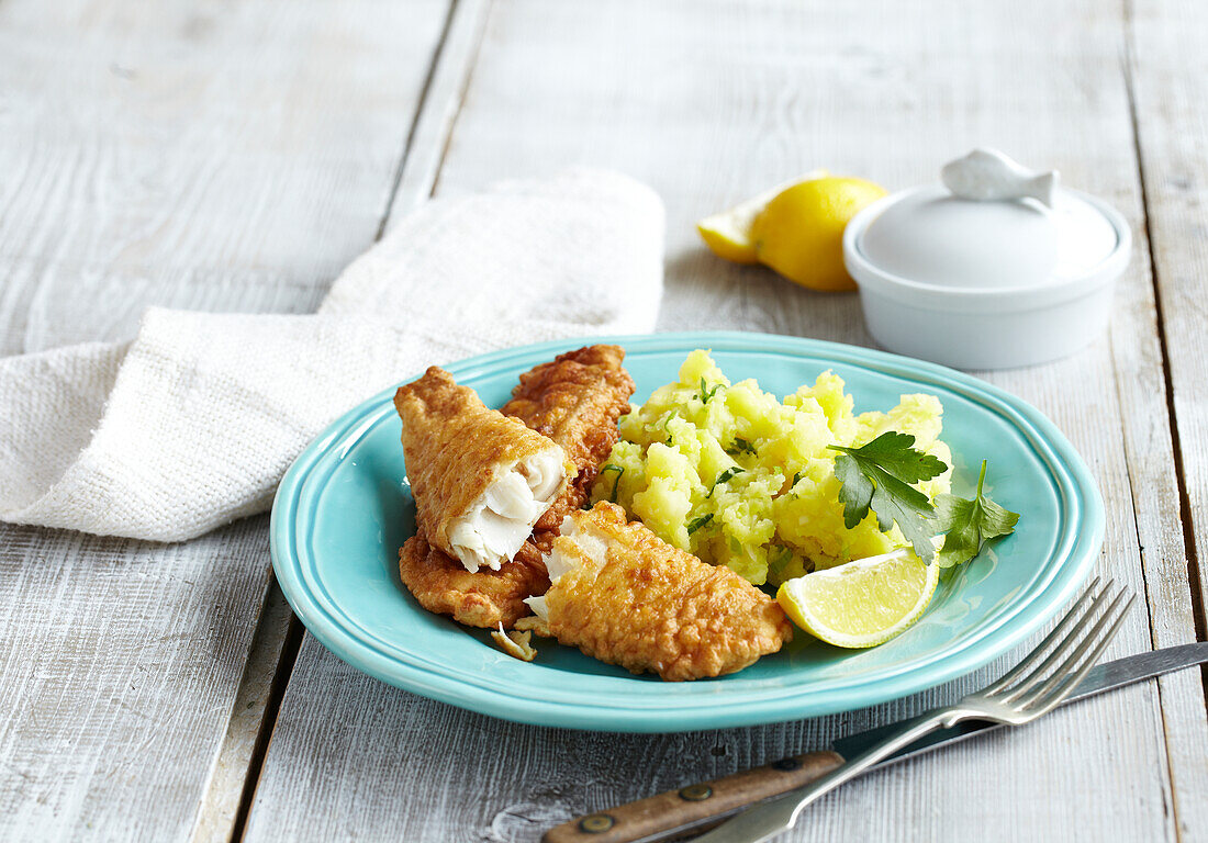 Fish schnitzel with mashed potatoes