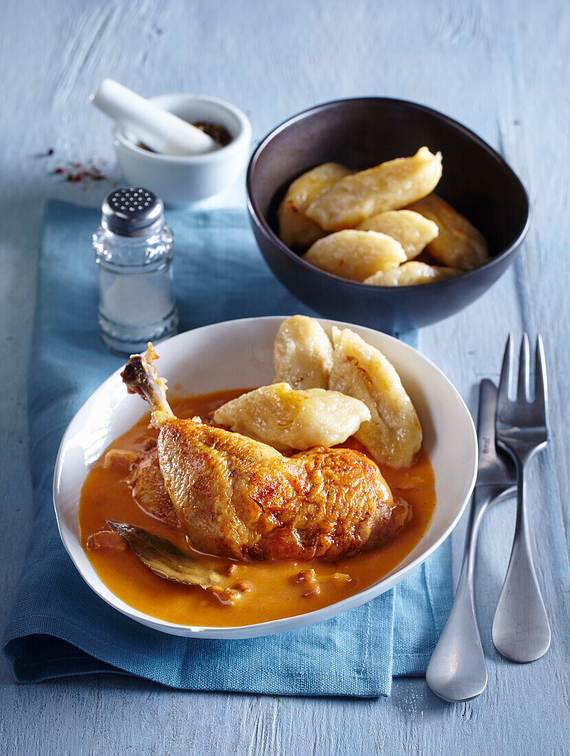 Chicken legs in a red pepper sauce with rye gnocchi