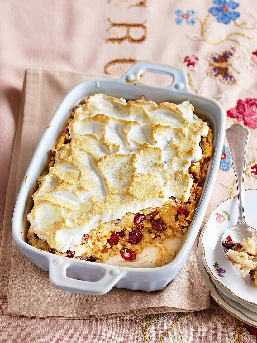 Rice pudding with cranberries and baiser