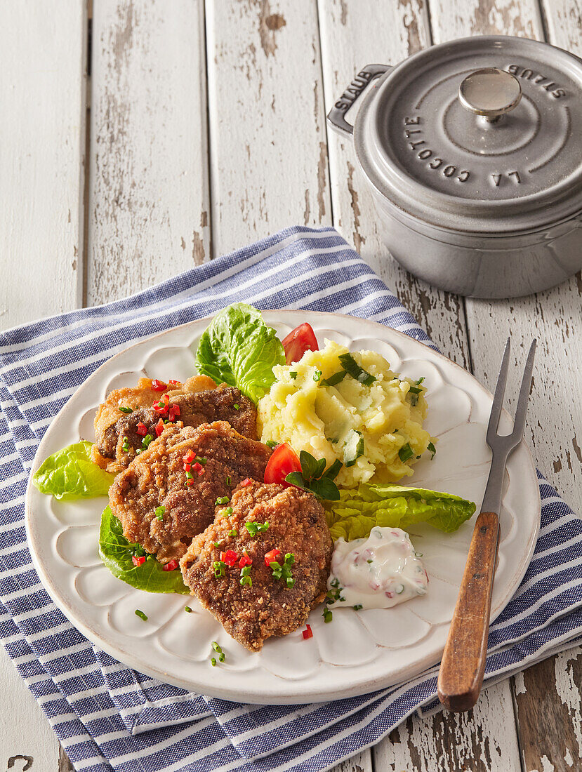 Fried pork liver with mashed potatoes