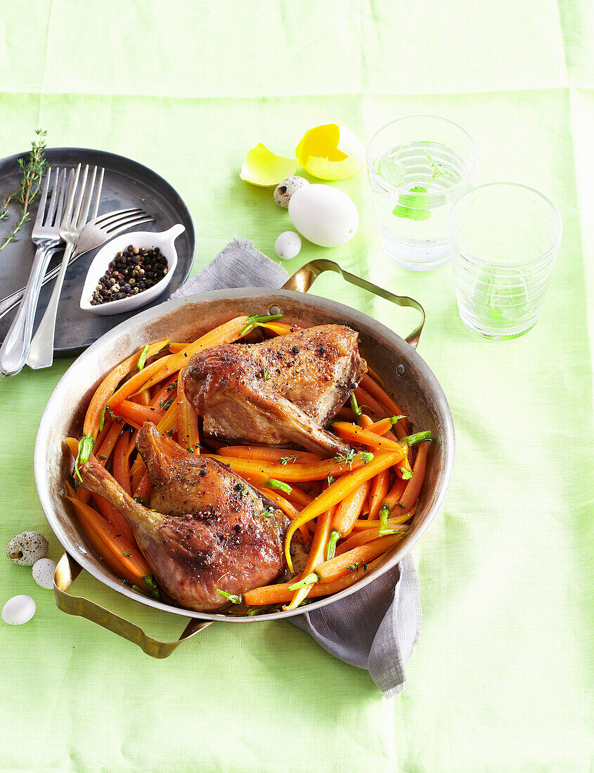 Peppered duck legs with carrots