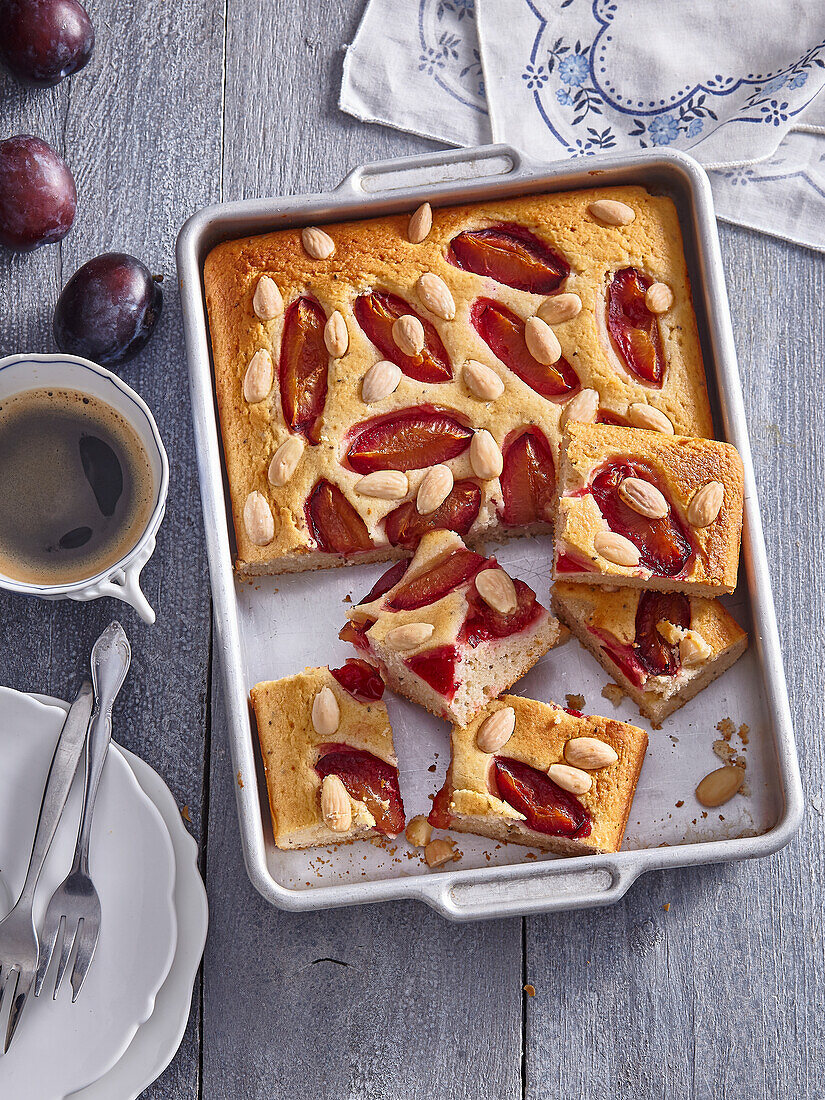 Buckwheat tray bake cake with plums and almonds