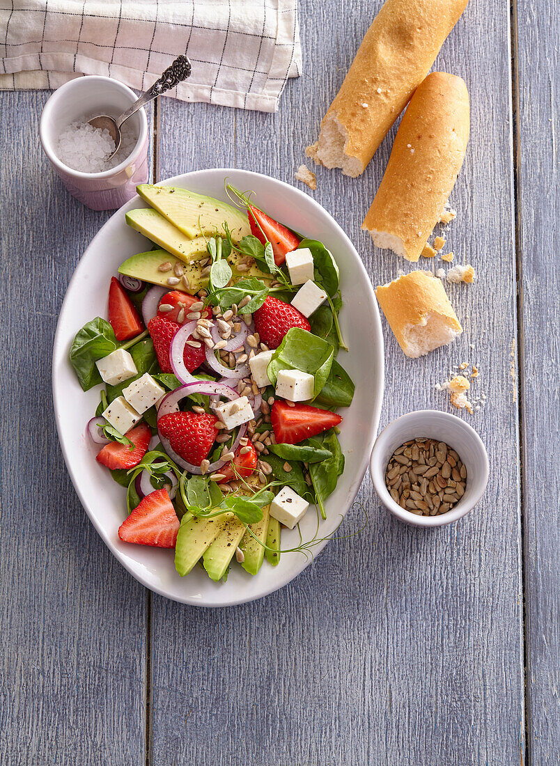 Salad with strawberries, avocado and feta cheese