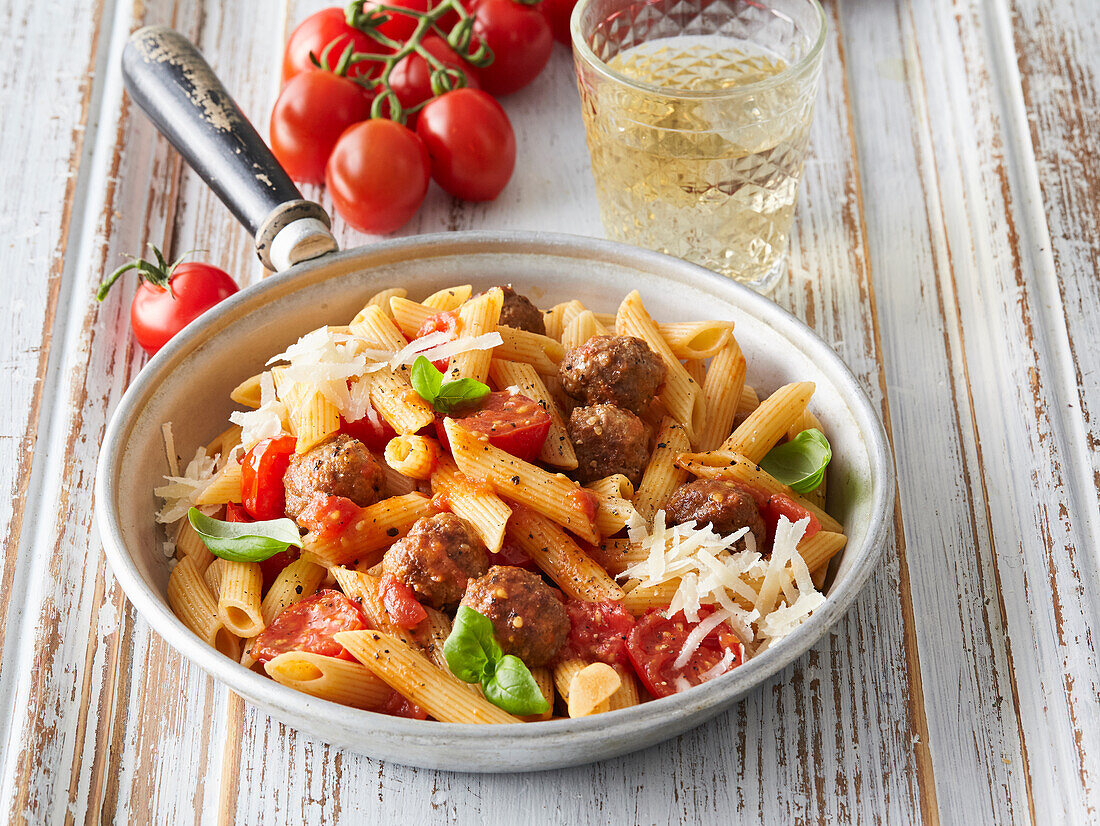 Pasta with tomato sauce and minced meat balls