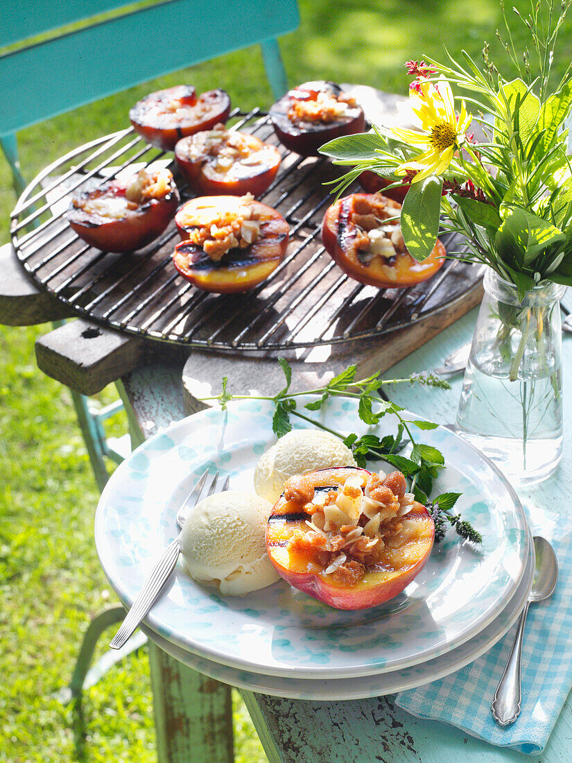 Grilled peaches with a crunchy almond biscuit filling