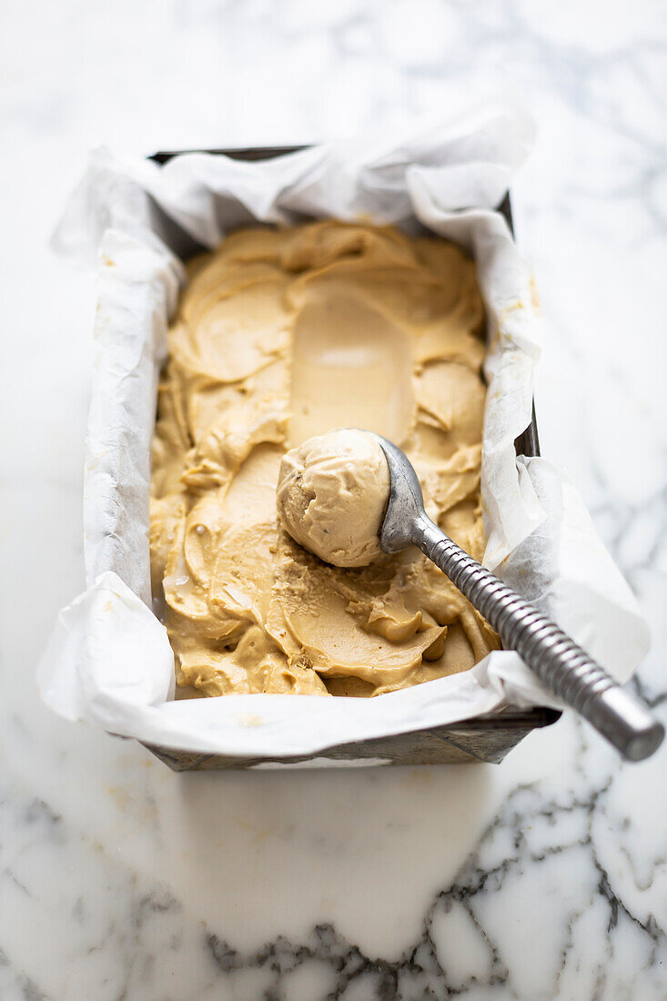 Caramel with an ice cream scoop