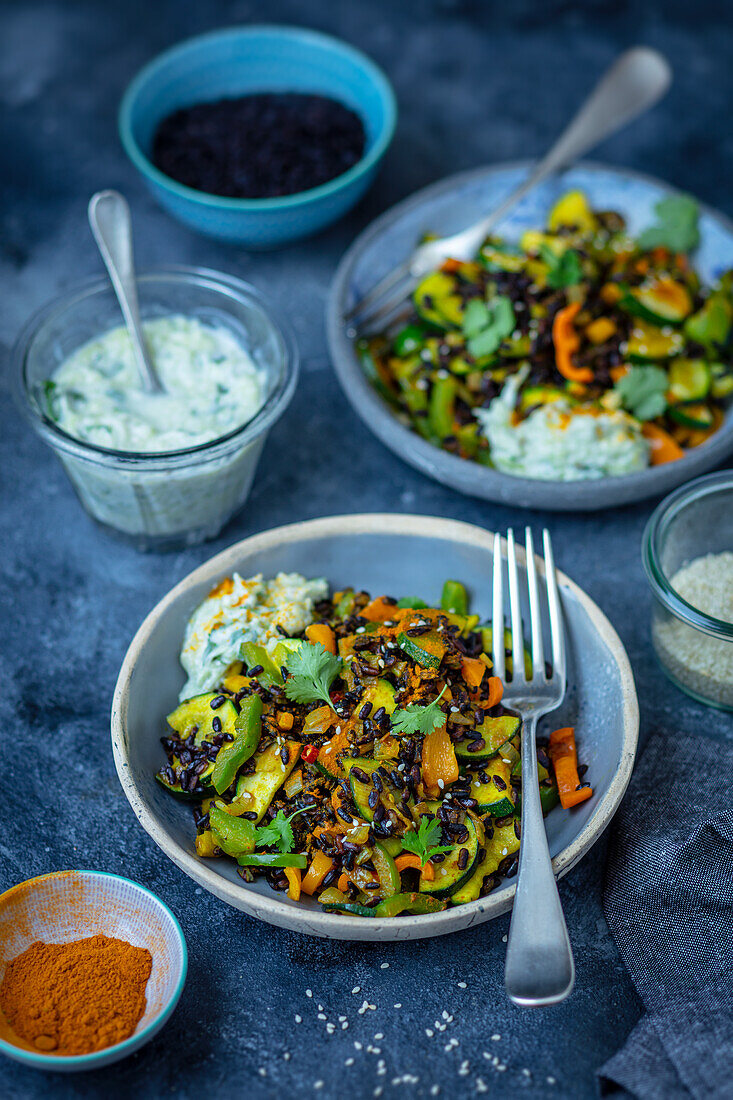 Black rice with vegetables and curry