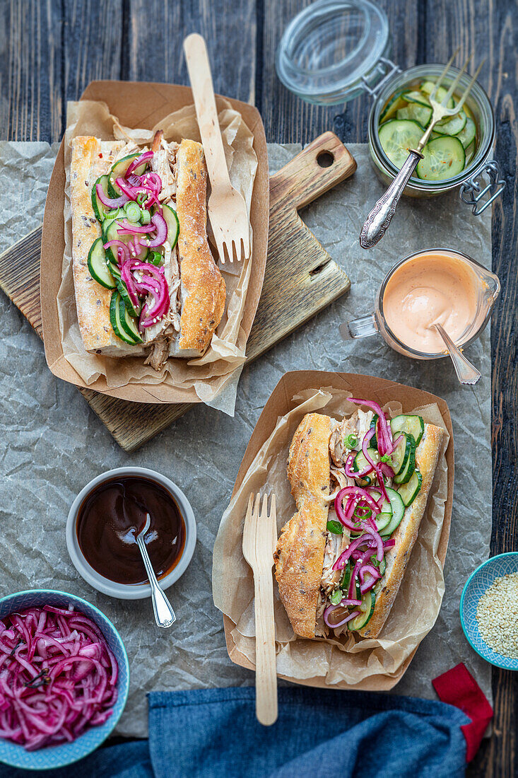 Sandwich with baked turkey and pickled red onions