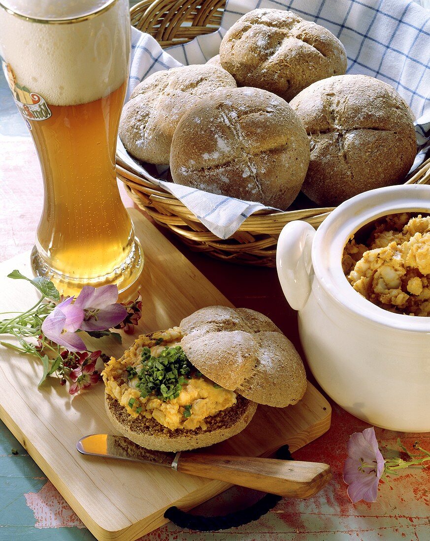 Roll with obatzta (cheese spread), Weissbier, bread basket
