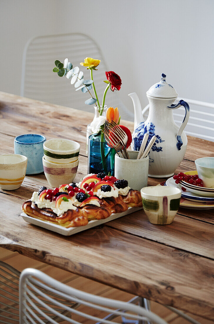 Eclairs with berries and cream