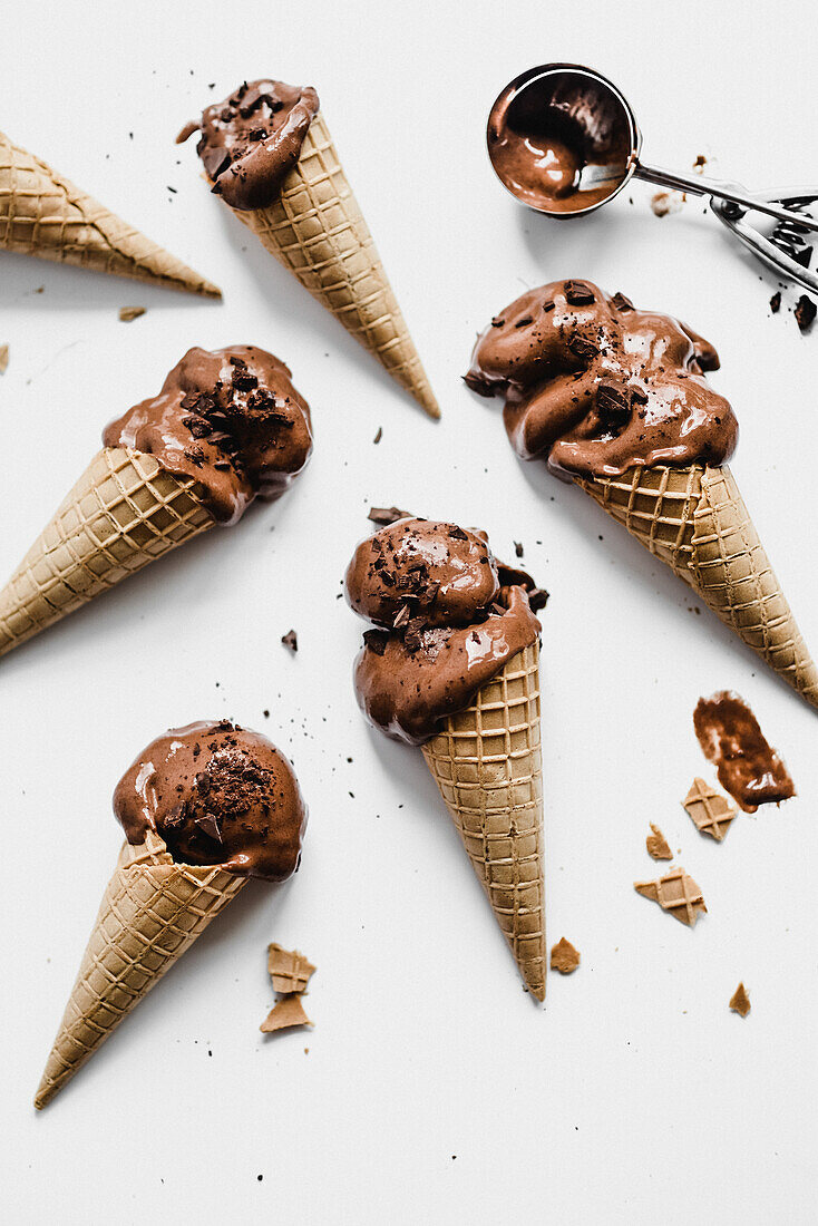Melting chocolate ice cream in cones