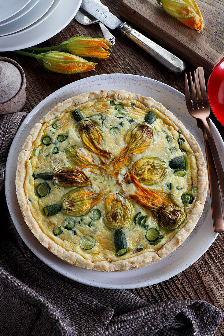 Tart with stuffed zucchini flowers