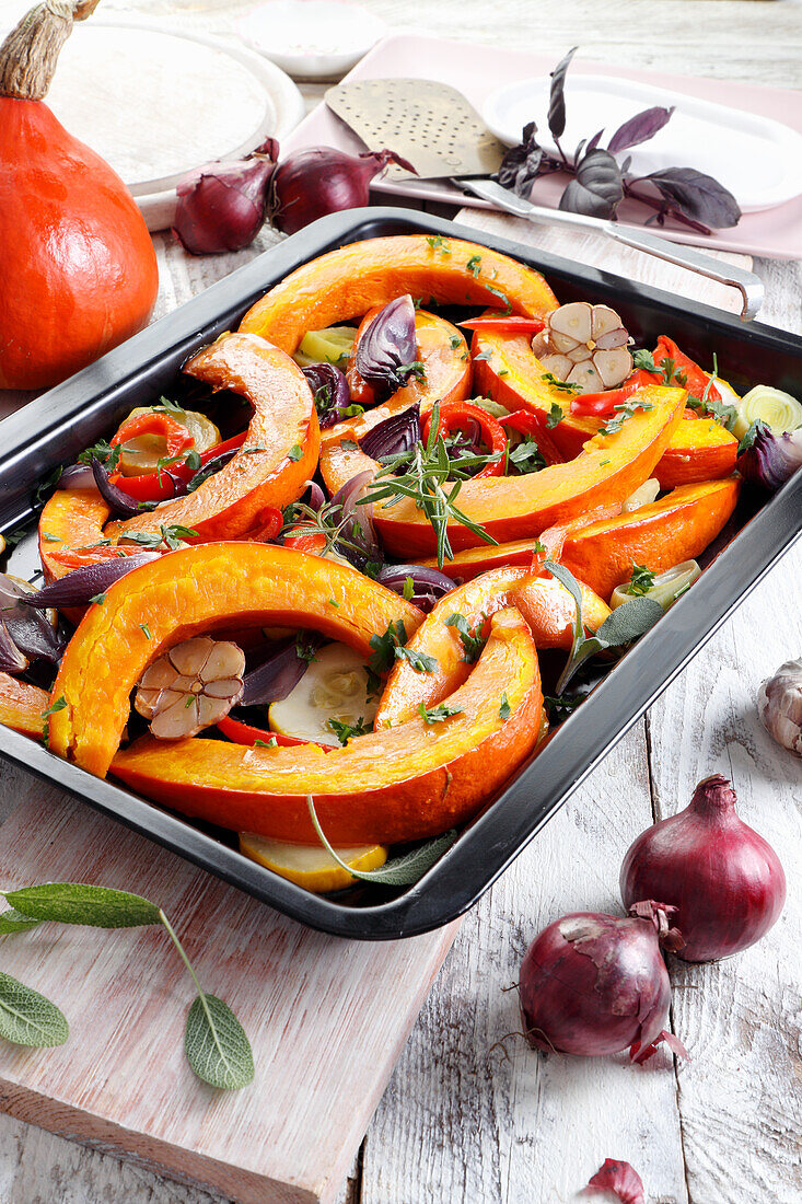 Baked vegetables with herbs (pumpkin, red onion, zucchini, pepper)