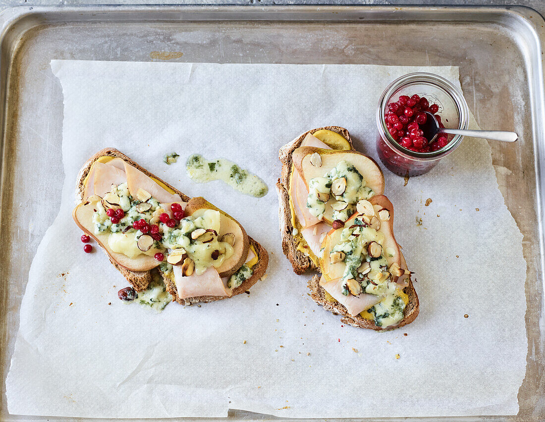 Roasted Gourmet sandwiches with sliced turkey, pears, and Gorgonzola