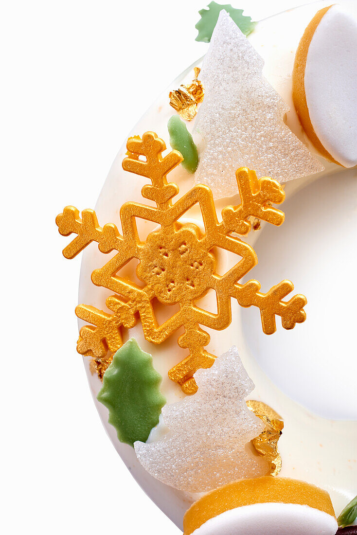 A sugar snowflake as a cake decoration