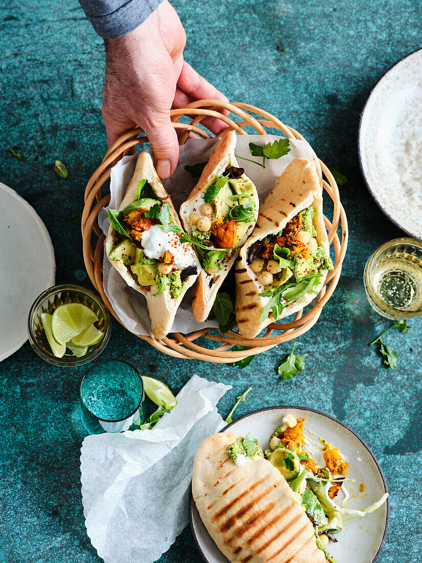 Stuffed pita bread with cashew pesto, pumpkin mash and chickpeas