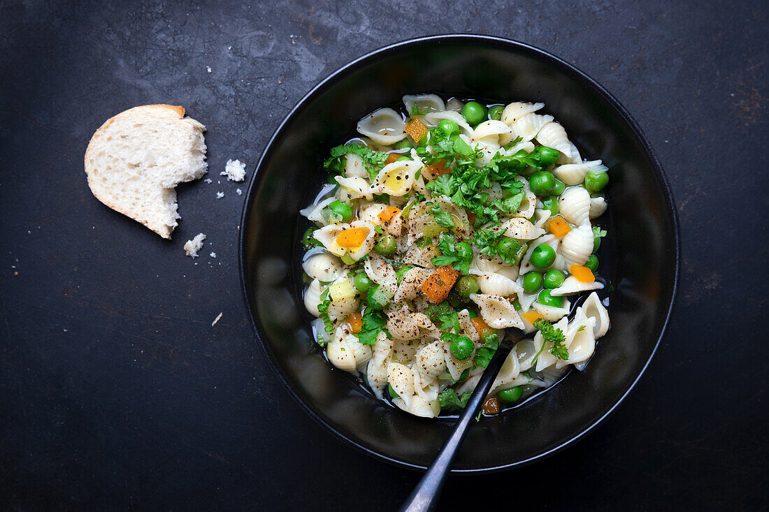 Vegan noodle soup with garden vegetables