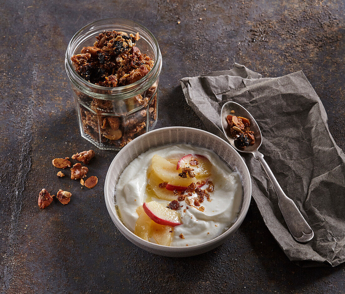 Gluten free granola in a jar with yoghurt and fruit