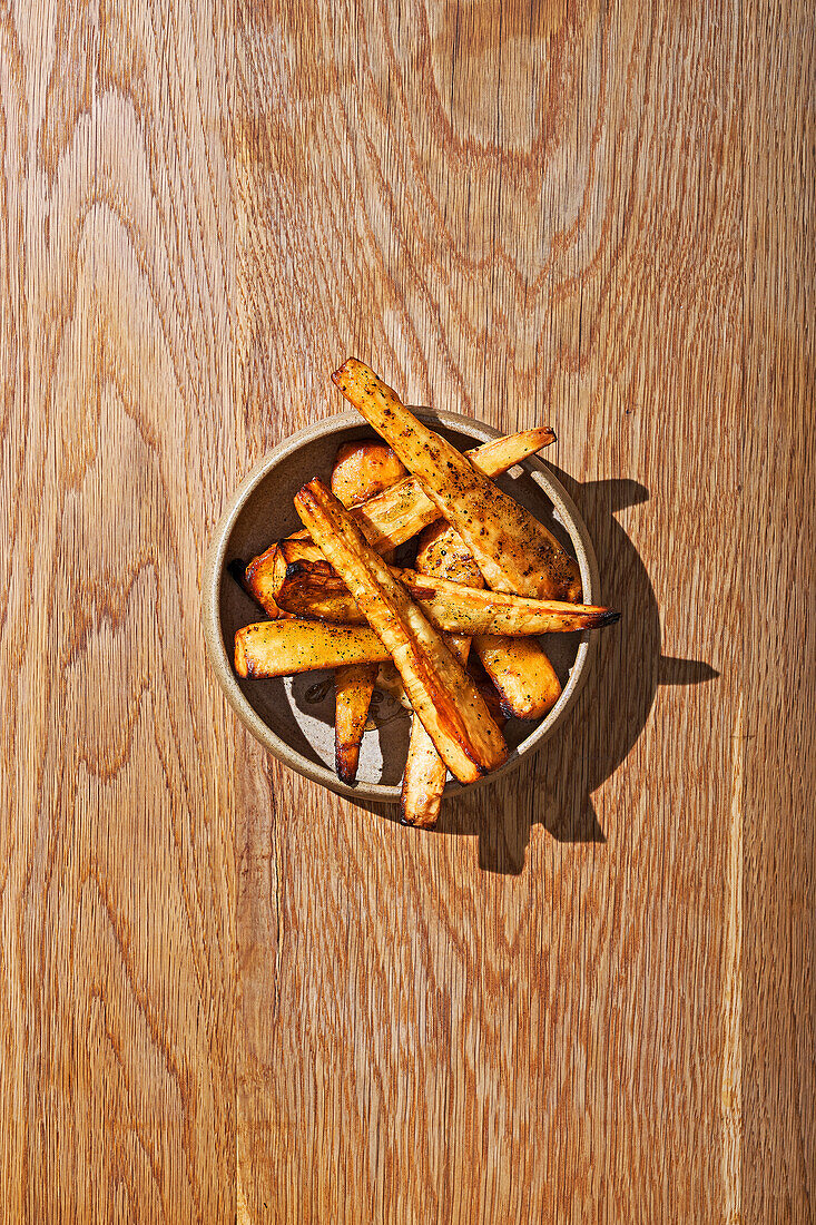 Roast parnsips with black seed honey