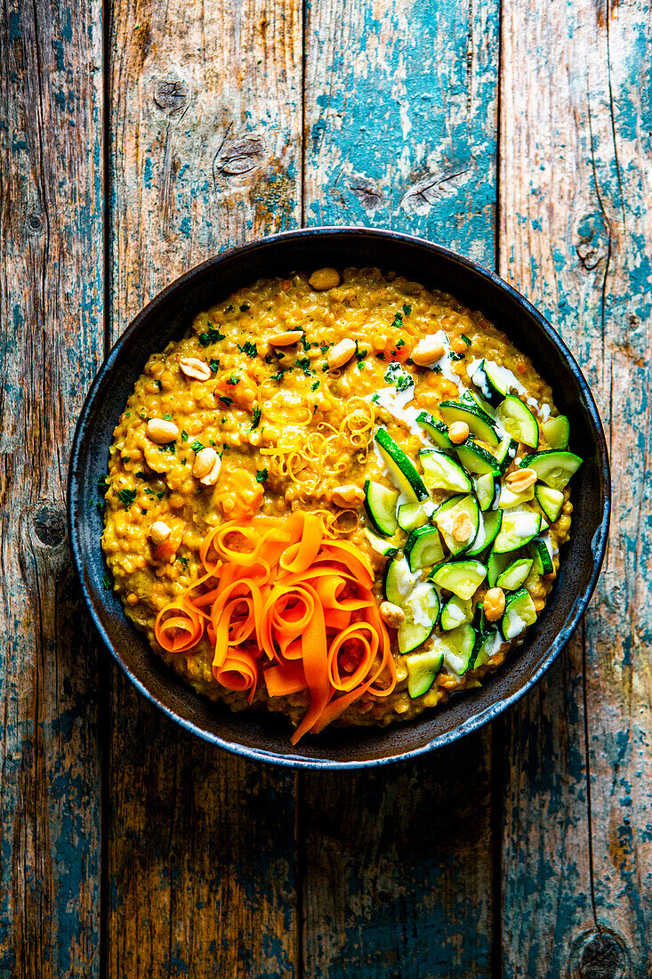 Creamy peanut-lentil dal with courgettes and carrots